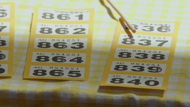 Raffle tickets row on party table cloth