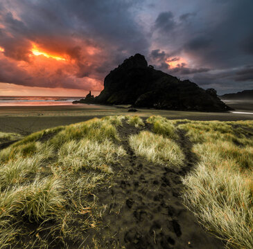 Dark Piha Black Sand Beach Sunset Shot