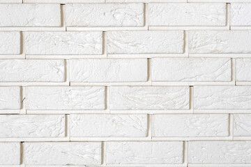 The texture is a  brick wall. light beautiful bricklaying. brickwork. abstract background