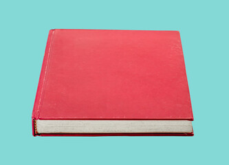 side of red book isolated on green background, high resolution image