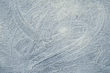 baking sheet greased with margarine and sprinkled with semolina