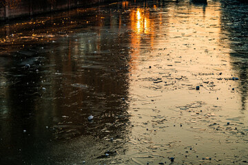 Sunrise over frozen river. Beautiful horizontal landscape.
