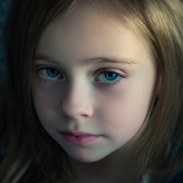 sad girl with big blue eyes