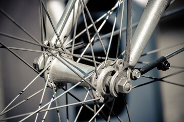 Fototapeta na wymiar bicycle rays, detail of rotation mechanism 