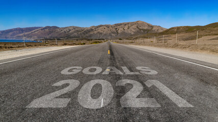 Goals 2021 written on highway road to the mountain