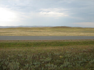 autumn steppes and hills of Khakasia, stormy sky