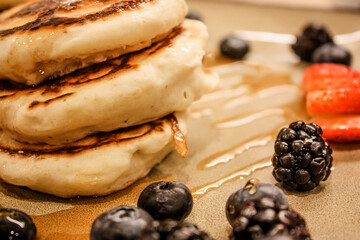 Pancakes and berries for breakfast