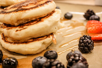 Pancakes and berries for breakfast