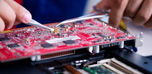 Repairman working in technical support fixing computer laptop tr