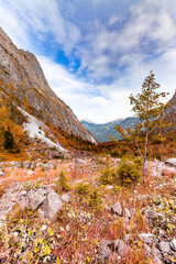 Fototapeta na wymiar Mountain landscape in autumn in the Watzmann massif in Berchtesgadener Land, Bavaria, Germany.