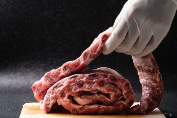 Close up 'Chef is selecting pork ribs.