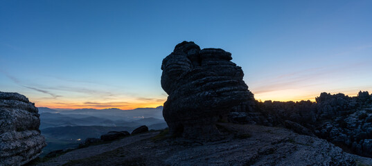 panorama view of the El Torcal Nature Reserve in Andalusia with ist strange karst rock formations at sunset