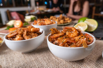 Shrimp, seadfoof to restaurants. Fried frish. 