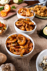 Shrimp, seadfoof to restaurants. Fried frish. 