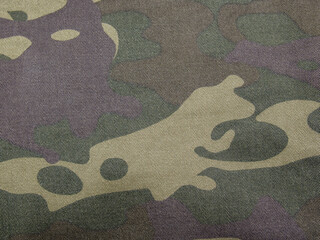 camo texture of textile material © Szymon