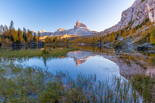 Becco di Mezzo mirrored in Federa lake in autumn, Dolomites, Italy