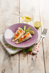 fish fillet with shrimp pink pepper carrots and lime