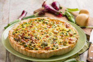savory cake with green peas onion and scamorza cheese