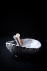 Traditional, handcrafted ceramic on dark background. Soft focus. Copy space.