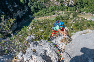 Multi-pictch rock climbing above the river, Gorges du Verdon, France