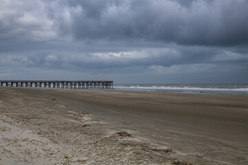 ocean pier on a cloudy day