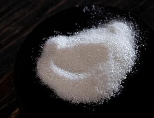 Obraz na płótnie Canvas selective focus photo of sodium ascorbate. dietary concept. dietary supplement low-key photo.