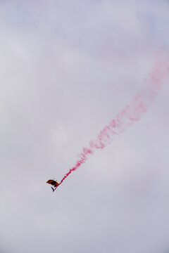 Low angle view of paratrooper during airshow