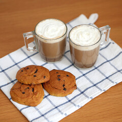Pumpkin spiced coffee with cream on top. Food photogphy
