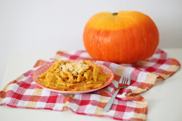 Pasta with pumpkin sauce. Autumn menu, food photography 