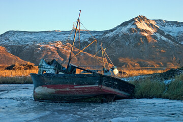 Wrecked ships on the frozen shore of Kodiak Island