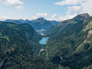 Lake of Montriond surrounded by mountains in summer, Morzine, les Portes du Soleil, France
