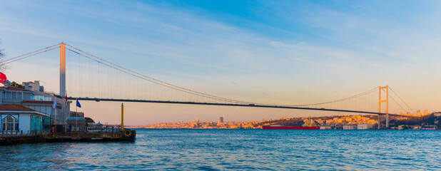 ISTANBUL, TURKEY. Panoramic view of Istanbul Bosphorus on sunset. Istanbul Bosphorus Bridge.
