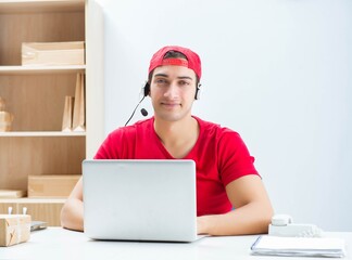 Call center worker at parcel distribution center in post office