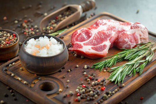 Raw meat with spices, on a cutting table.Natural product.