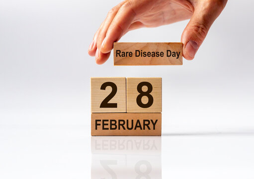 International rare disease day, 28 February inscription on wooden cube calendar