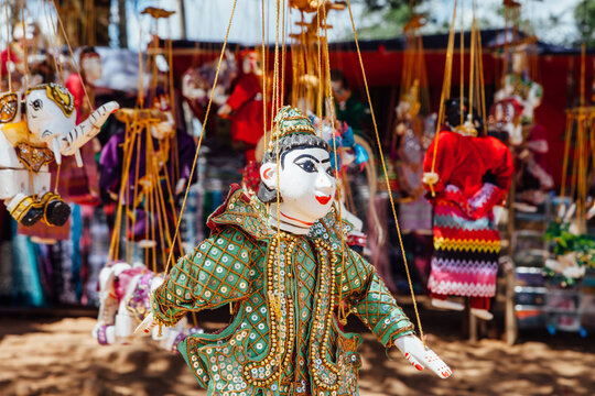 Puppets hanging for sale at market