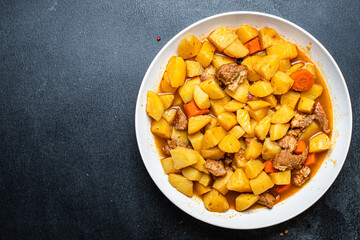 potatoe stewed goulash and meat roast second course vegetables portion on the table healthy meal snack outdoor top view copy space for text food background rustic image