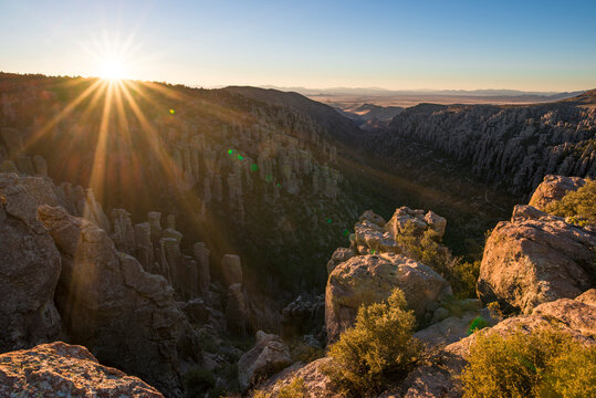 Scenic view of mountains against clear sky during sunset