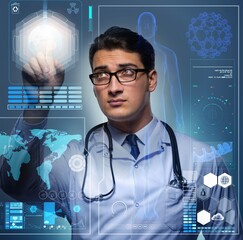 Doctor in futuristic medical concept pressing button