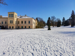 Park and Castle Cechy pod Kosirem, Moravia, Czech during winter, snow