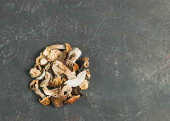 Dried porcini mushrooms on a decorative background