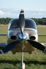 restored old yellow biplane with one engine per propeller © Jakub