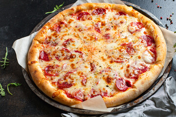 pizza pepperoni or salami meat sausage and double cheese fast food Takeaway ready to eat on the table meal snack outdoor top view copy space for text food background rustic image