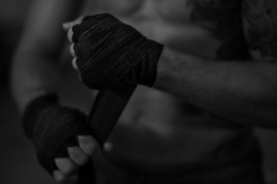 Close up of boxers hands
