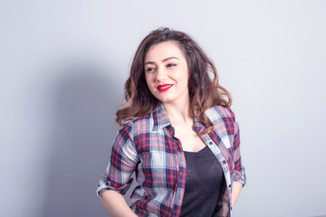 beautiful,happy woman posing in studio