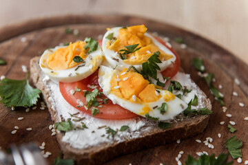 Close up scene on diet sandwich with eggs and tomato