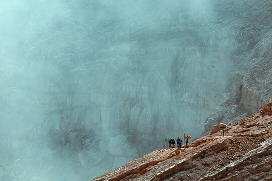 Group of tourists near Ijen lake