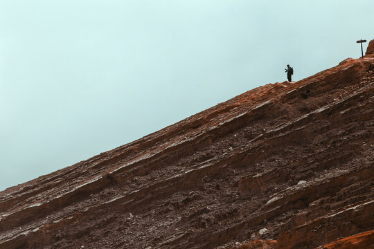 Man with photo camera near Ijen volcano