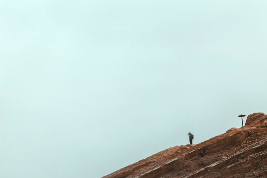 Man with photo camera near Ijen volcano