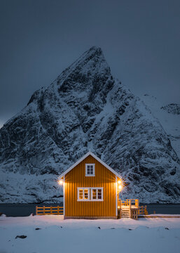 Red house and beautiful mountain  in Stunning Norway